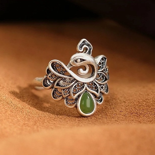 N065 Nhẫn khổng tước bạc thái đính đá xanh