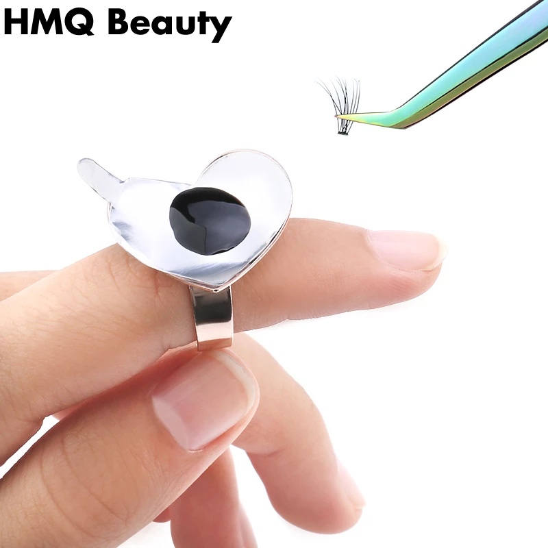 Một trái tim màu hồng hình cao su... Dán mắt lại. Khung hình sắc tố.