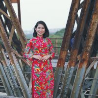Áo dài con công cho mẹ