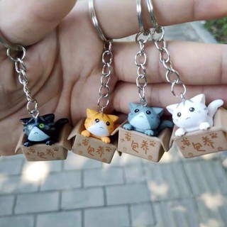 Móc khoá mèo trong hộp