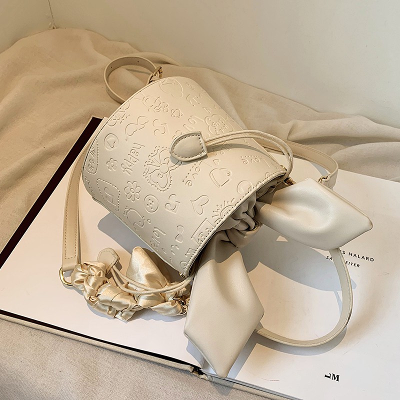 Túi xách đeo vai nữ hình trụ tròn in nổi họa tiết cá tính mặt thắt nơ dễ thương Ulzzang siêu xinh ❤️