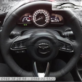 Da bọc vô lăng mazda đời facelift