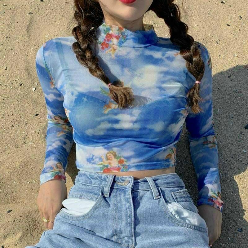 Áo Croptop Tay Dài Cổ Lọ Phối Lưới Xuyên Thấu In Hình Thần Cupid A5292