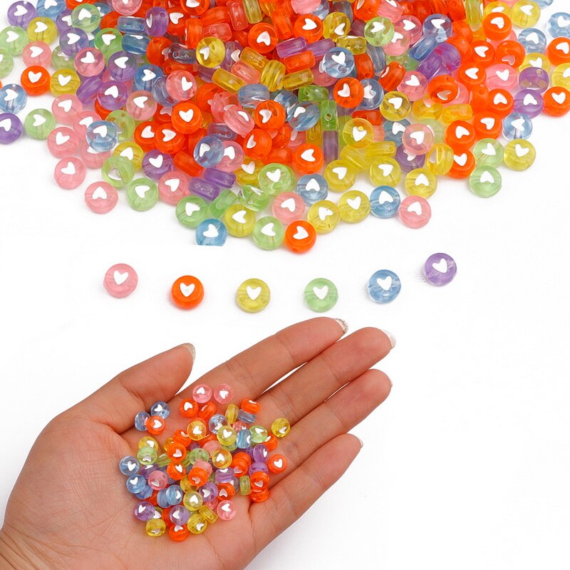 Bộ 100 hạt nhựa acrylic trong suốt hình trái tim kích thước 7mm làm trang sức