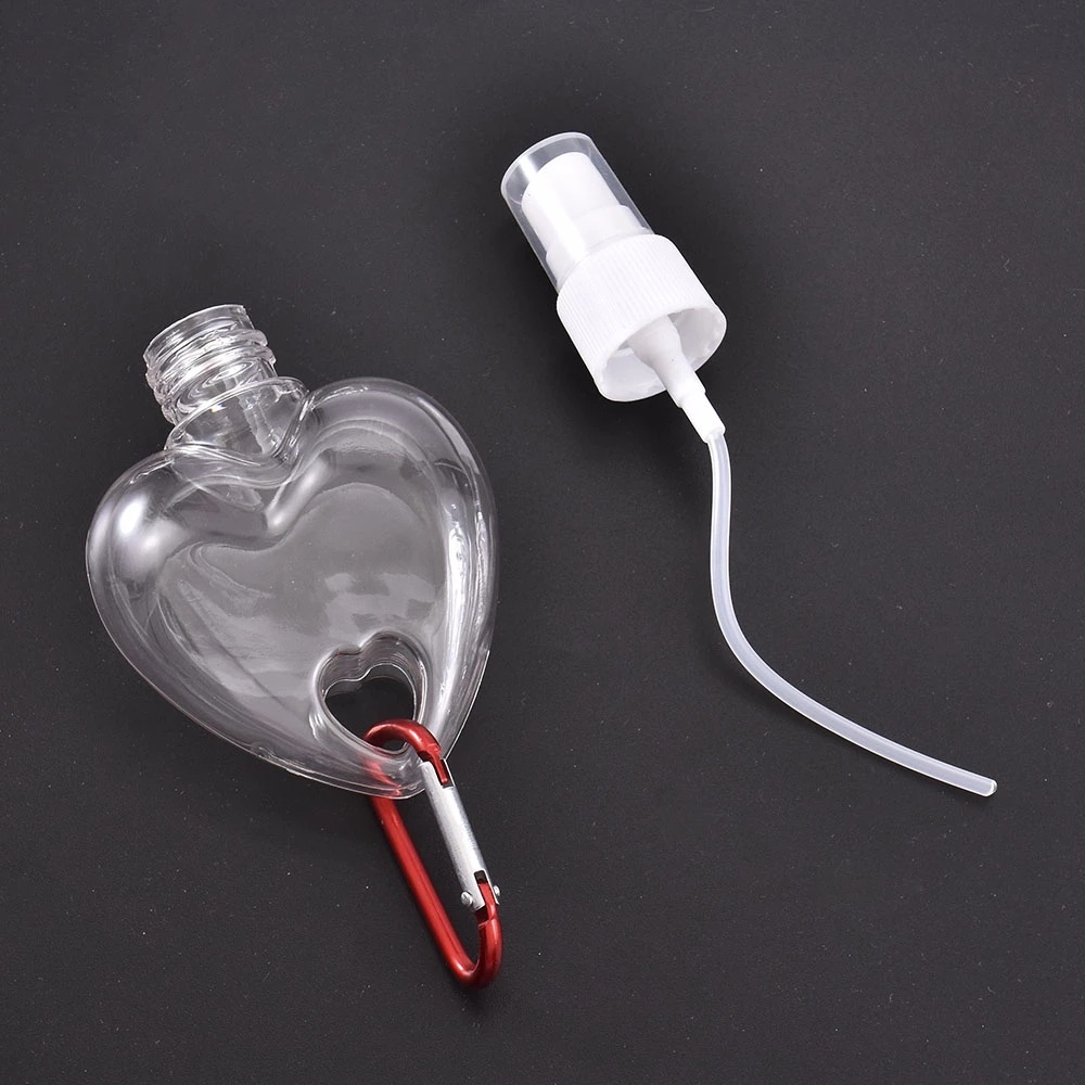 Chai đựng mỹ phẩm rỗng hình trái tim có móc treo tiện lợi màu ngẫu nhiên 50ml