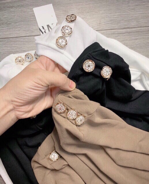 Xả- Áo thun giấy dài tay cổ tròn khuy vai