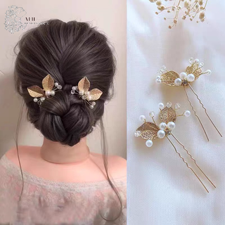 N05_hoa cài tóc cô dâu 2 chiếc lá, trang điểm cô dâu, make up tiệc, phụ kiện cưới và trang điểm