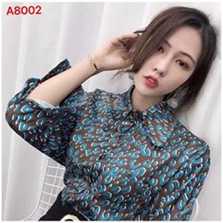 áo sơ mi  họa tiết báo
