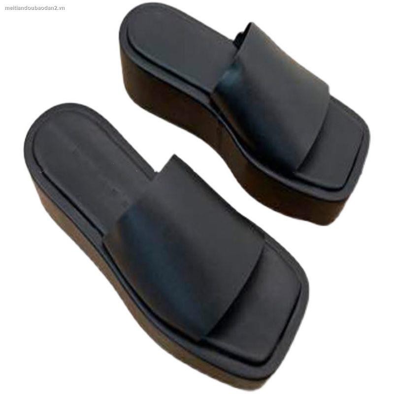 Black wedge platform flip-flops