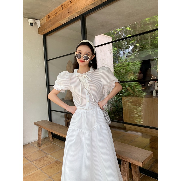 Jane Áo sơ mi croptop tiểu thư tay nhí - chân váy sold out
