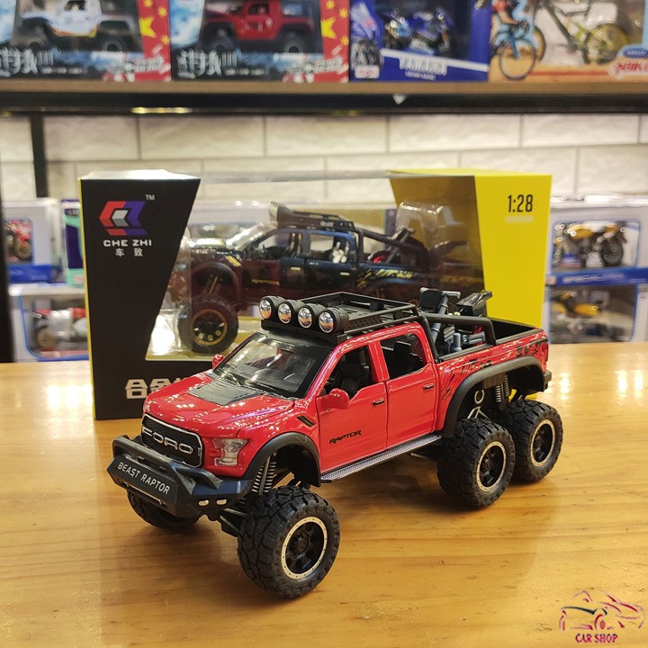 Mô hình xe ô tô Ford F150 Raptor 6x6 tỉ lệ 1:28 màu đỏ