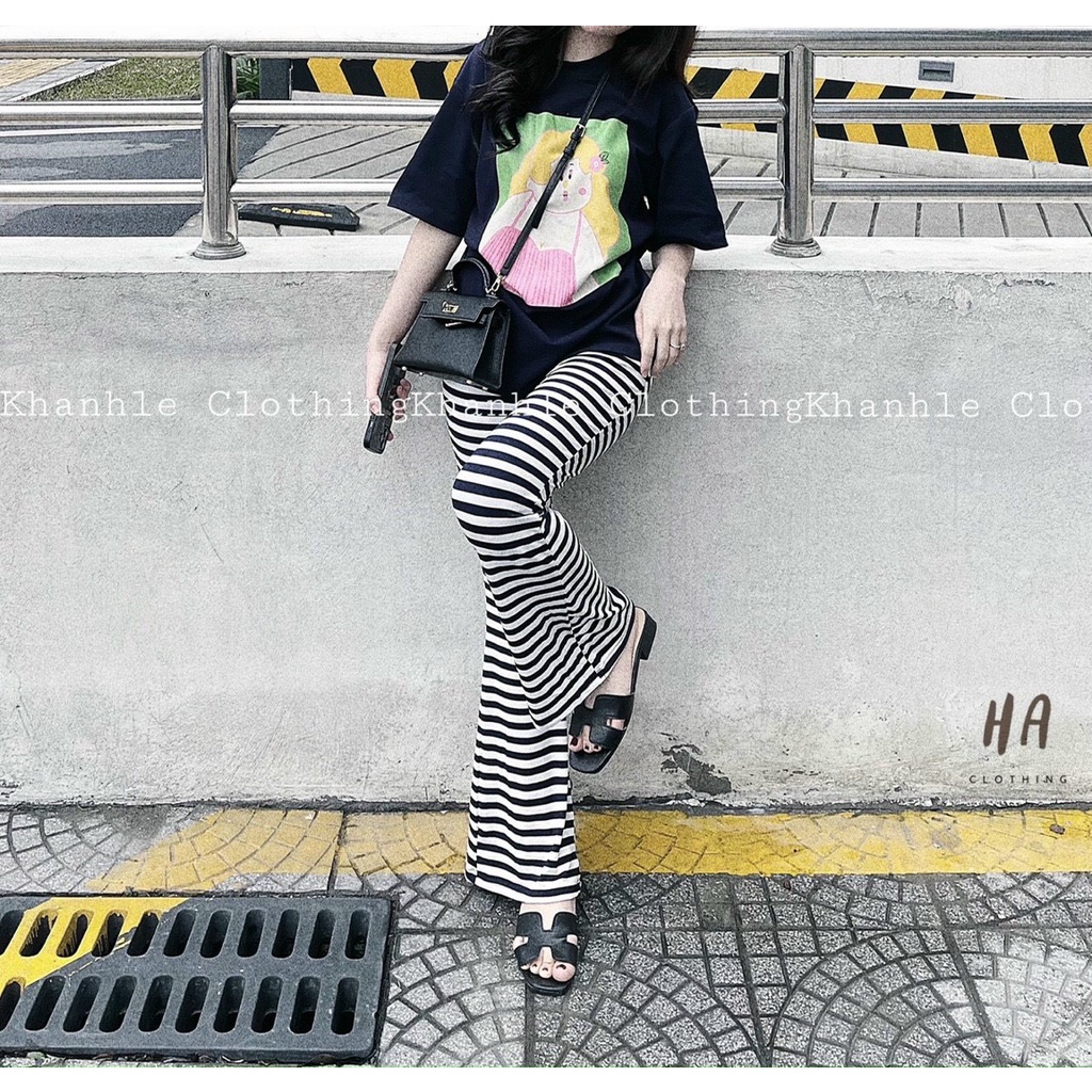 set bộ áo thun form rộng cô gái tóc vàng quần loe dài sọc k