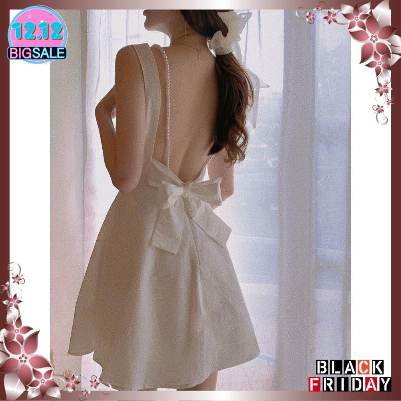 Đầm trắng hở lưng cột nơ dây chuỗi nhẹ nhàng xinh xắn | BigBuy360 - bigbuy360.vn