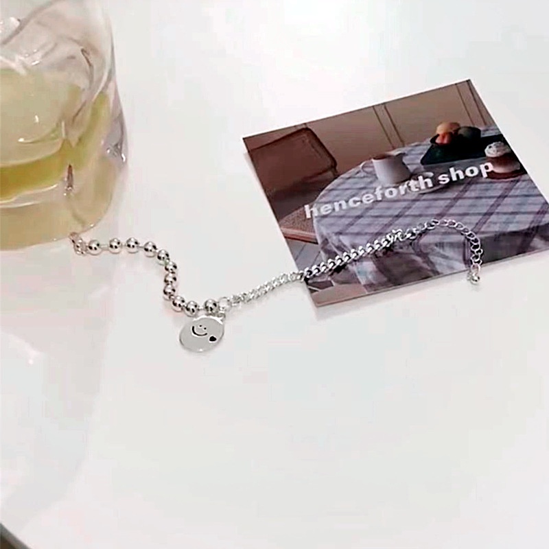 Vòng tay phối hạt giả ngọc trai và hình mặt cười thời trang Hàn Quốc