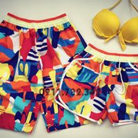 Cặp quần đôi nam nữ mặc đi biển họa tiết nhiều màu sặc sỡ kèm áo bikini nữ ( Cam kết như hình)