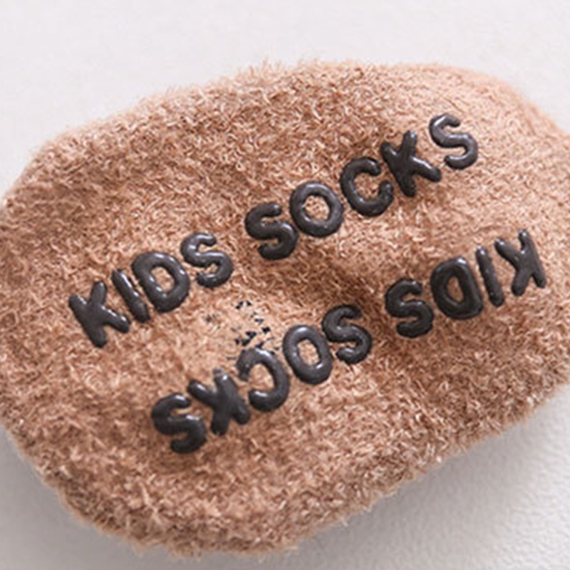 Đôi vớ dày giữ ấm chống trượt họa tiết hoạt hình dễ thương cho bé