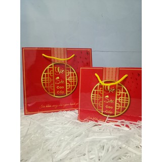 Túi giấy đồng tiền đựng hộp hoa mai 100g