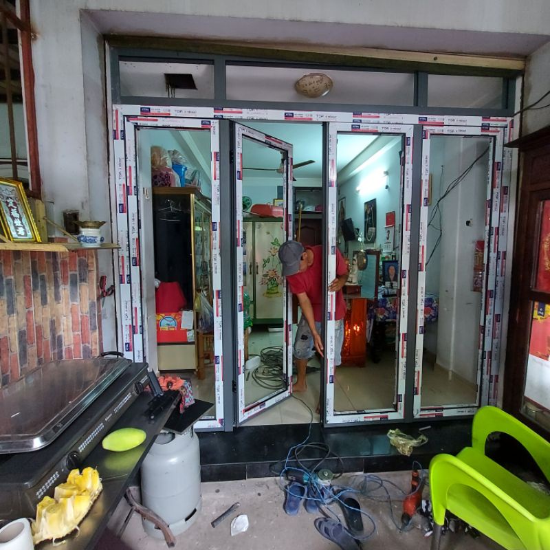 Cửa nhôm xingfa 4 cánh kính cường lực