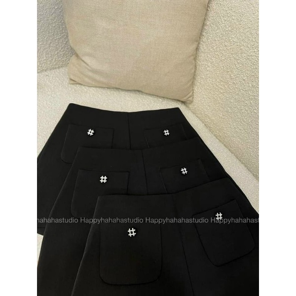 chân váy chữ a phồng túi trước thêu  vải tuyết mưa cạp khóa sau lưng cao có quần bên trong