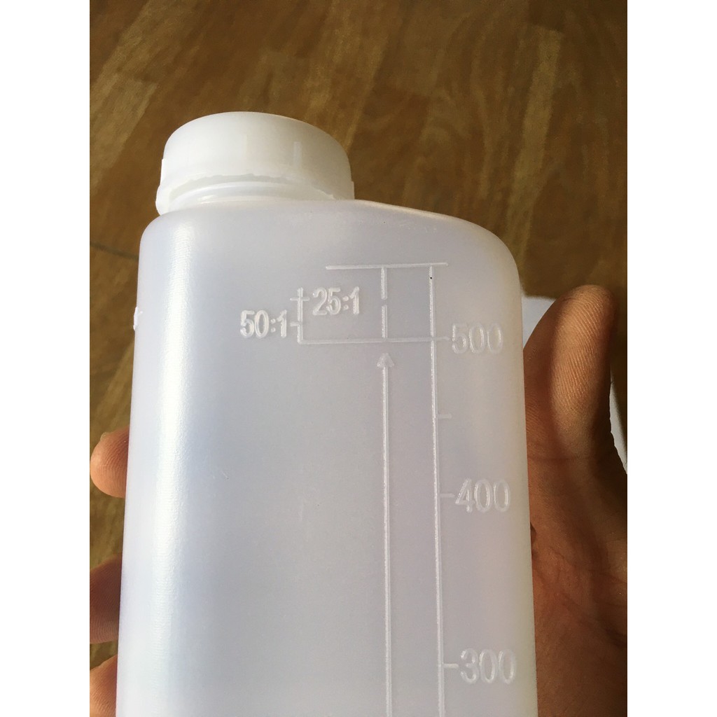 Bình hỗ trợ pha nhiên liệu chạy máy cưa