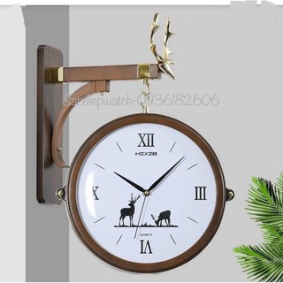 Đồng hồ treo tường hai mặt