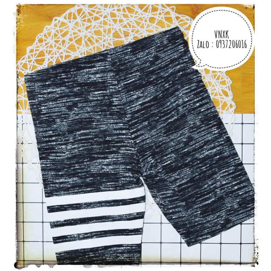 Quần legging đen sọc trắng