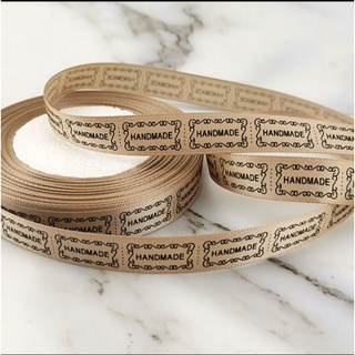 Ruy băng satin lụa 1,5 cm có chữ"handmade"(giá lẻ 1m)