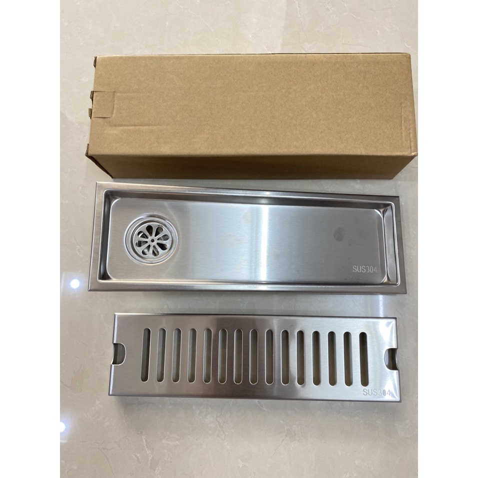 Ga thoát sàn, phễu thu sàn loại dài 30 cm lỗ thoát lệch, thoát cân ,Inox 304.