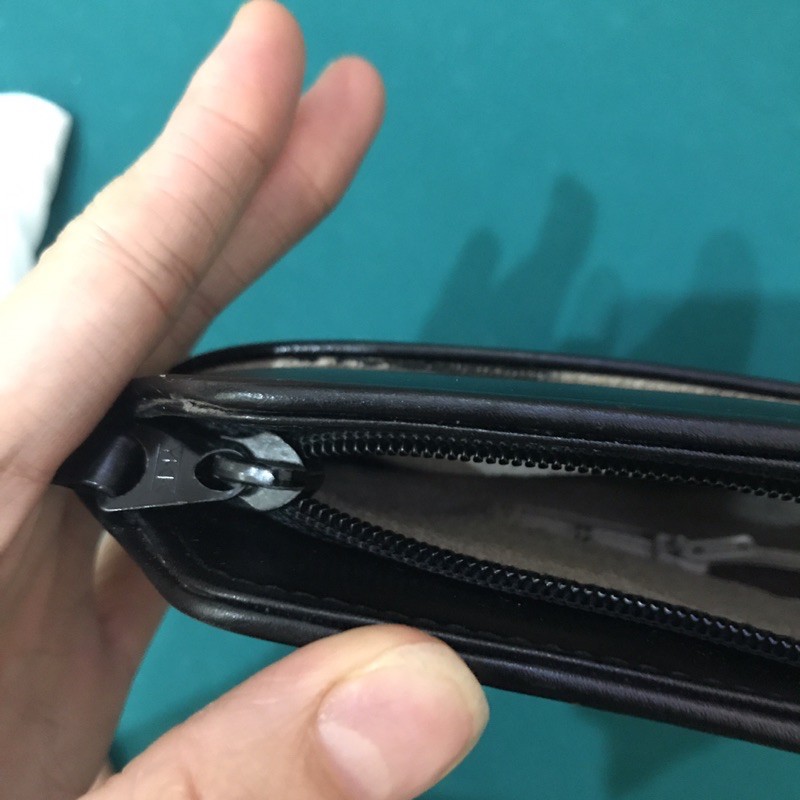 Clutch da thật hiệu emaneul ungaro unisex