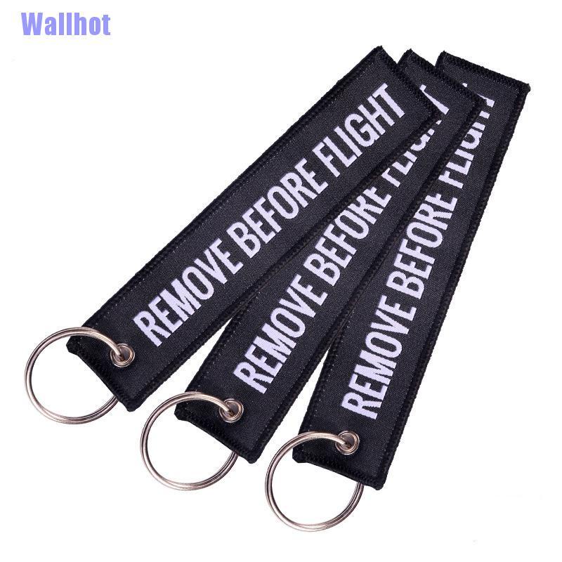Móc khóa dải dây thêu chữ Remove Before Flight kích thước 13x3cm thời trang