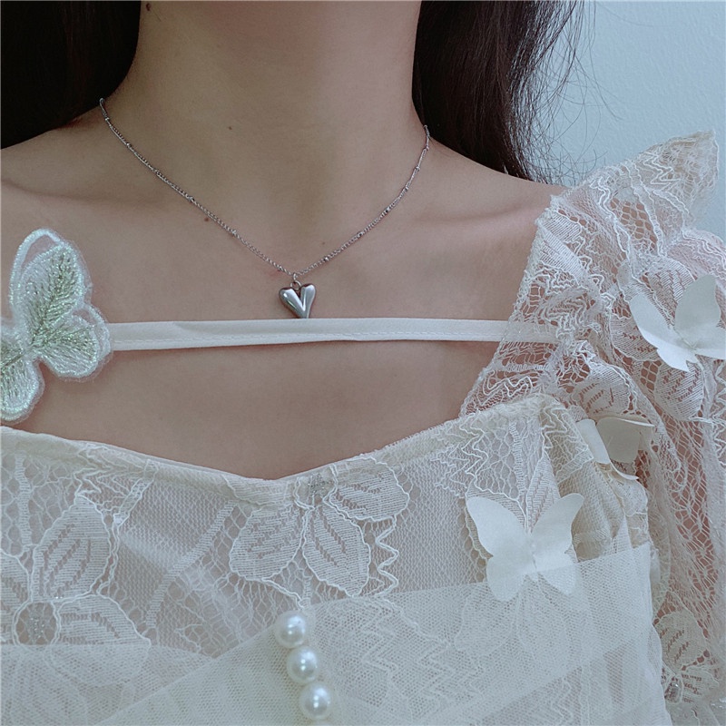 Dây chuyền nữ mặt trái tim kéo dài đính bi tròn Trang Sức SG