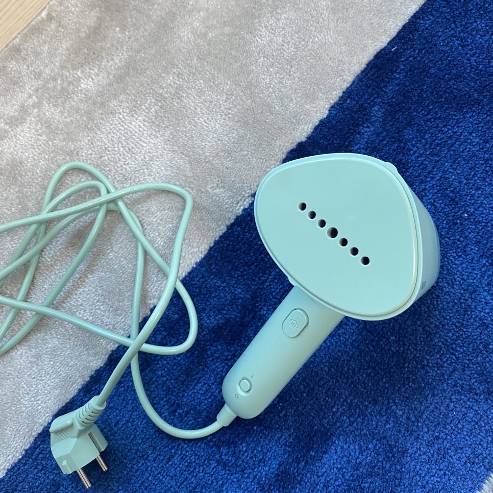 Bàn ủi hơi nước cầm tay Philips STH3020 Philips STH3010