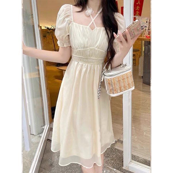 ĐẦM KEM MIDI CHÉO DÂY CỔ TAY BO