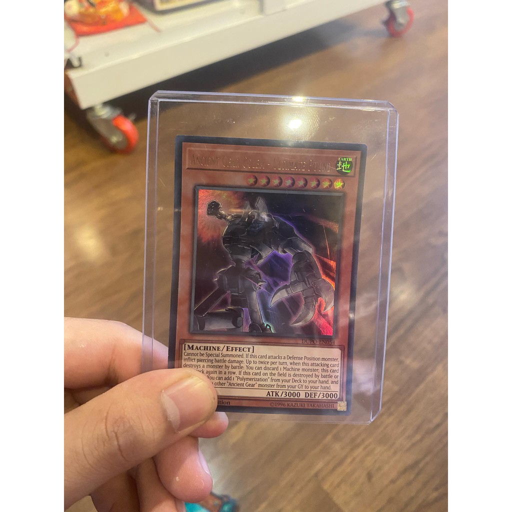Lá bài thẻ bài Yugioh  Ancient Gear Golem Ultimate Pound – Ultra Rare - Tặng bọc bài nhựa bảo quản