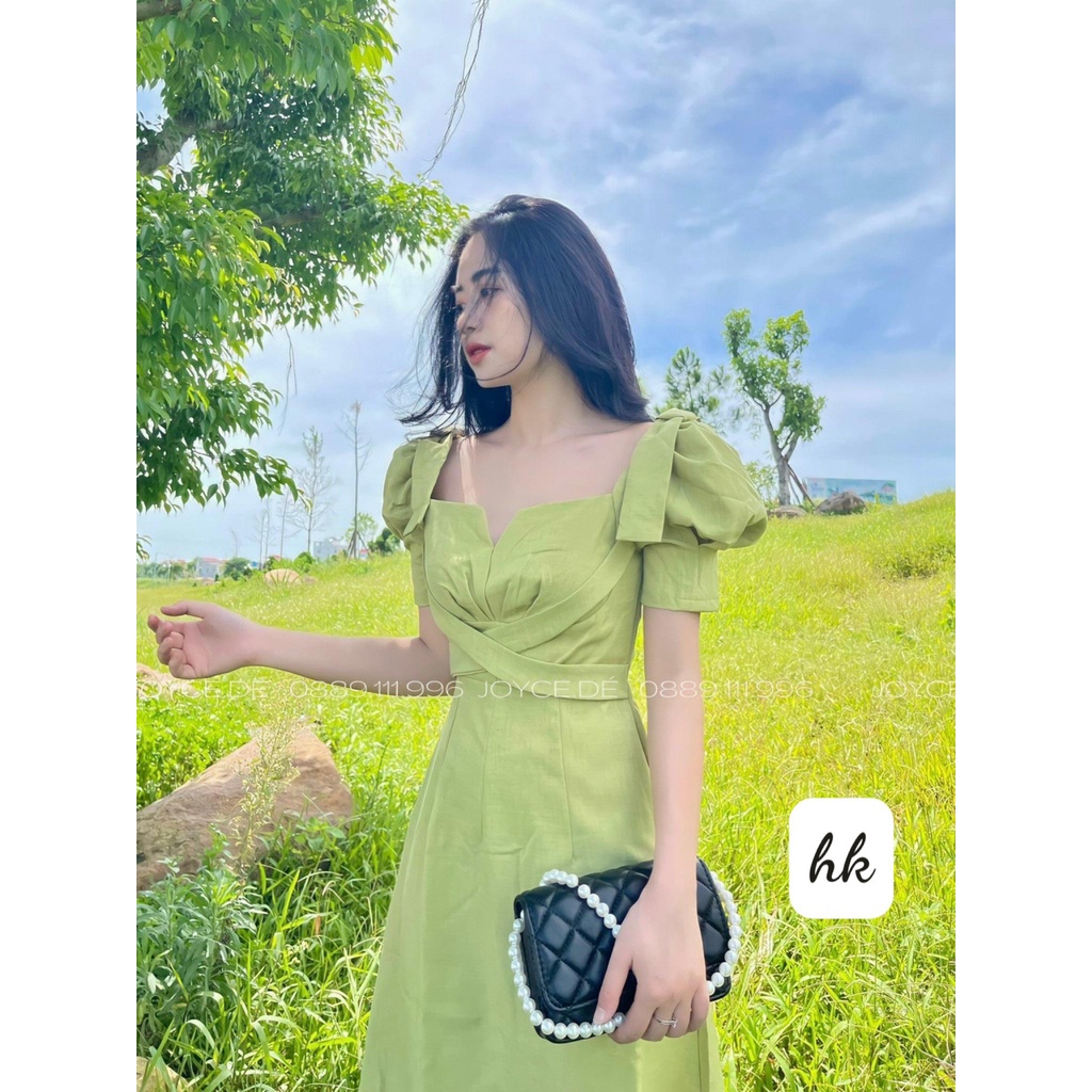 Váy xanh đan dây chéo nơ