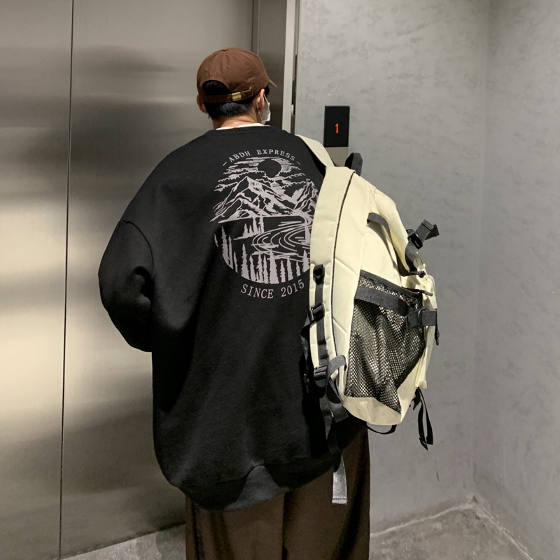 Áo sweater cổ tròn oversize phong cách thời trang cá tính cho nam