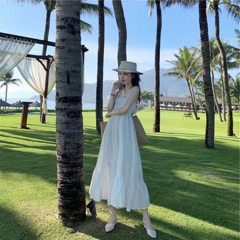 Đầm Maxi Trắng Đi Biển Hai Dây Có Lót Trong Cột Nơ Sau Lưng- Mẫu Hot Trend 2021