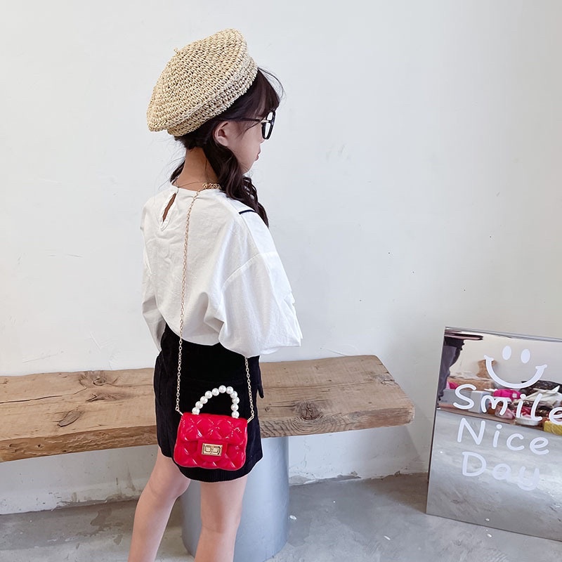 Túi xách đeo chéo mini quai ngọc cho bé gái
