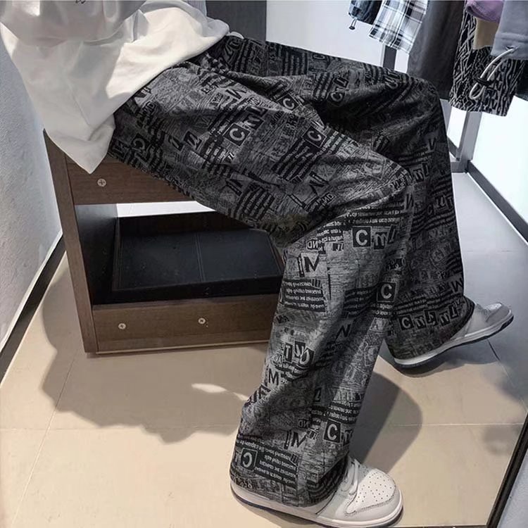 Quần ống rộng in họa tiết tờ báo phong cách Âu Mỹ thời trang cho nam