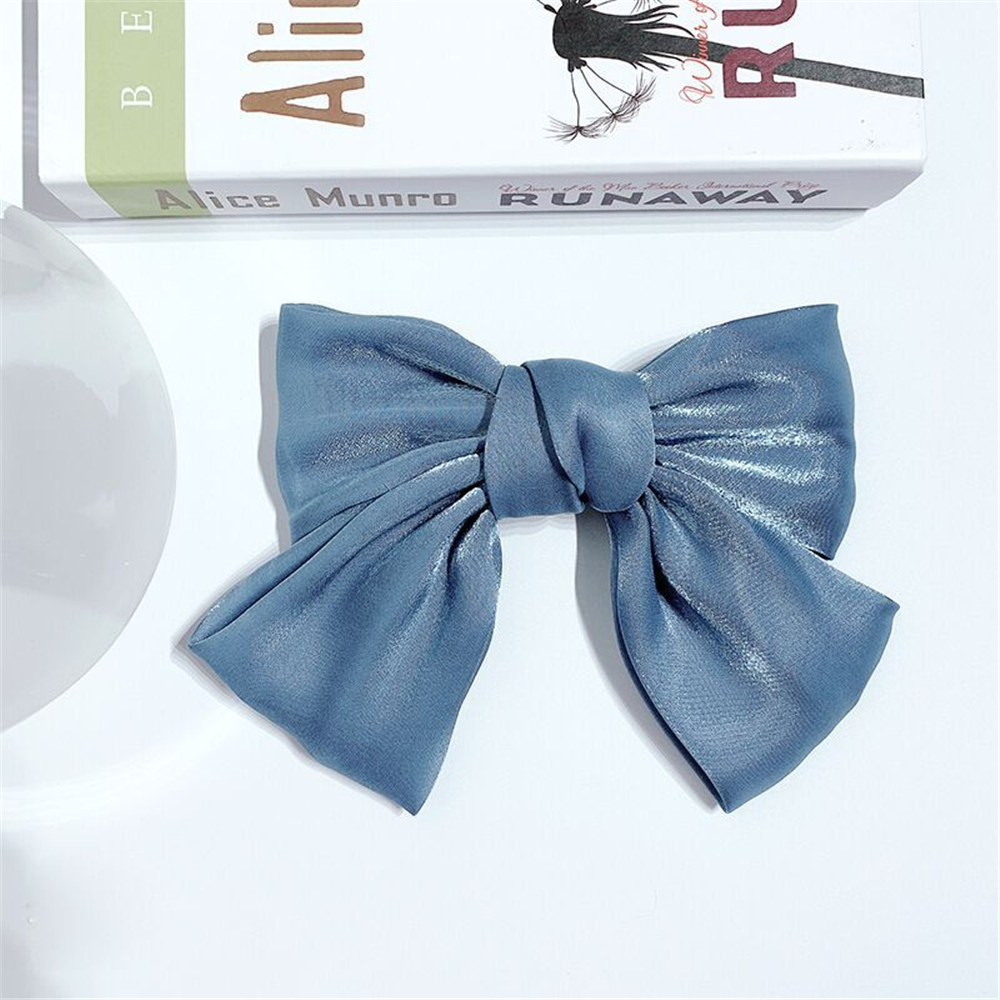 Kẹp tóc hình nơ dễ thương dành cho nữ