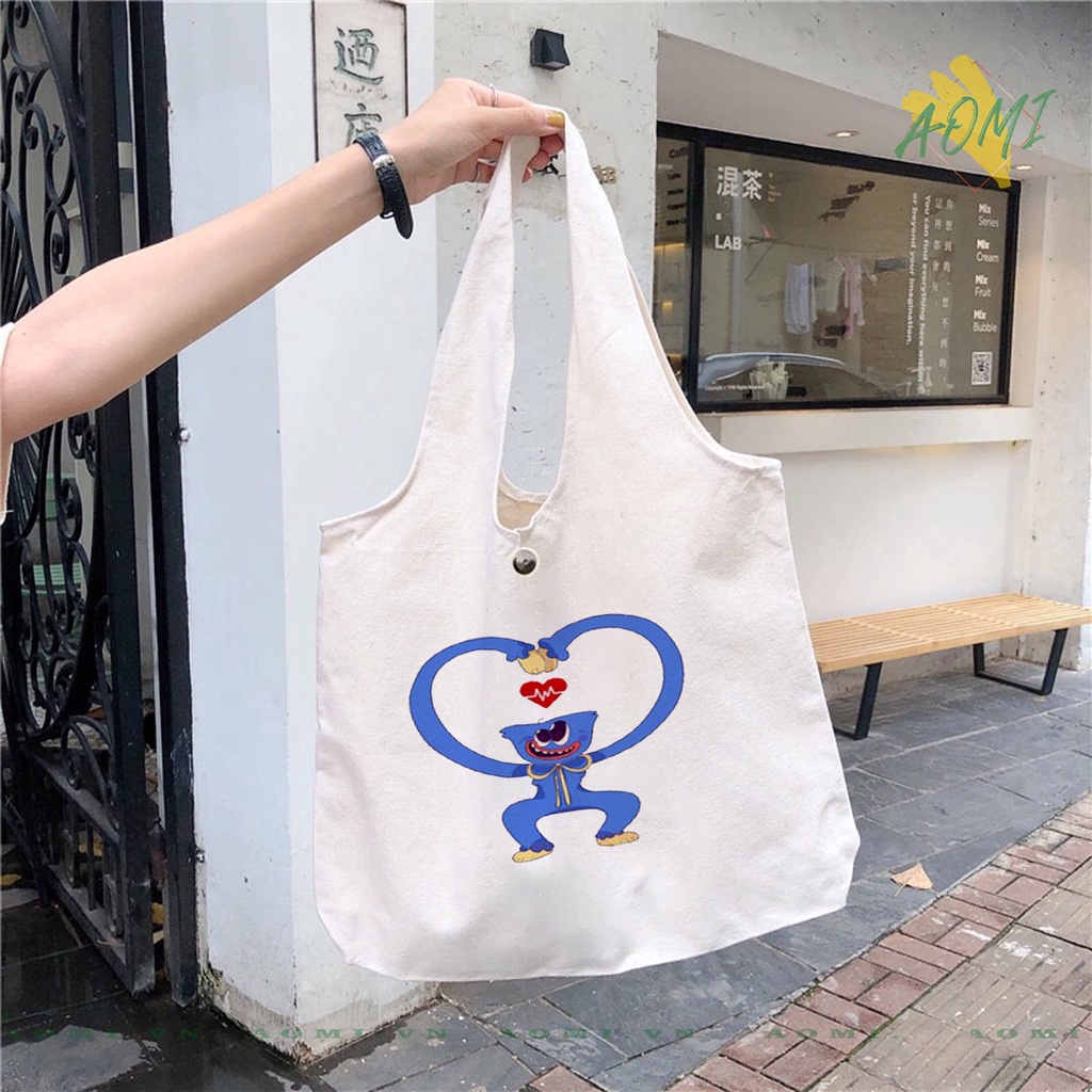 TOTE CANVAS  HUGGY WUGGY FORM TRÒN TÚI VẢI ĐEO VAI BAG NÚT BẤM SIZE LỚN AOMIVN DU LỊCH DẠO PHỐ CÁ TÍNH