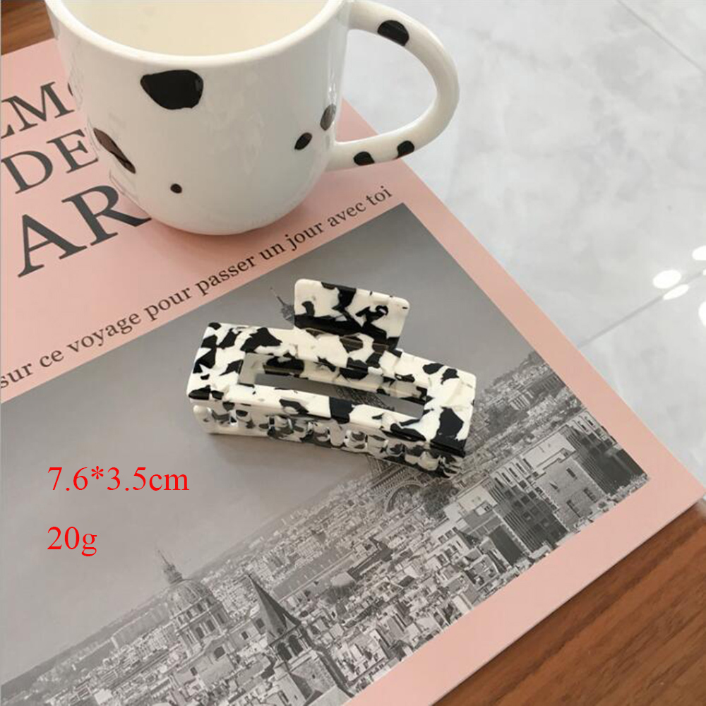 Kẹp tóc họa tiết bò sữa xinh xắn cho nữ