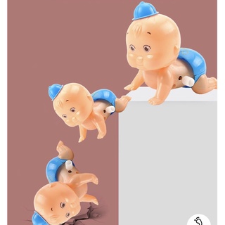 Em bé bò bằng dây cót