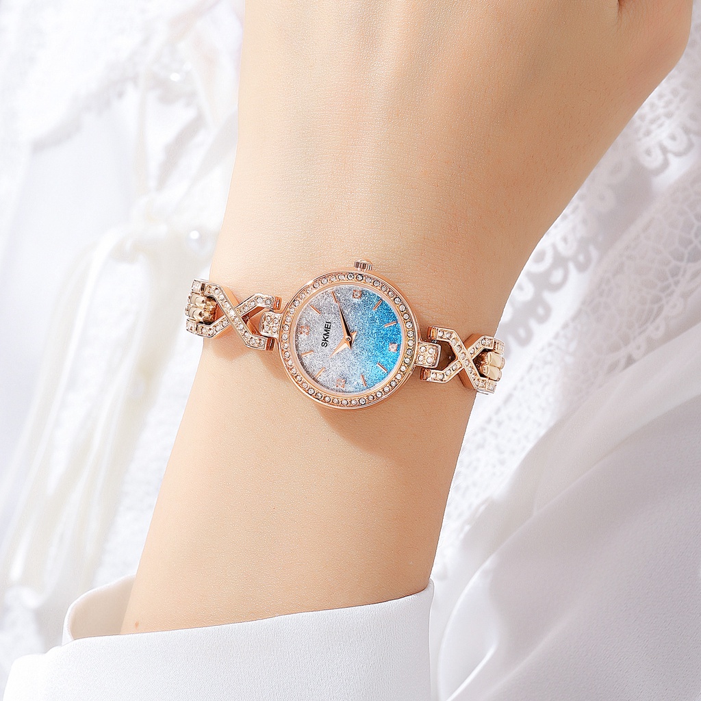 Đồng Hồ Quartz Nữ Đính Hột Xoàn Dây Thép Chống Thấm Nước SKMEI