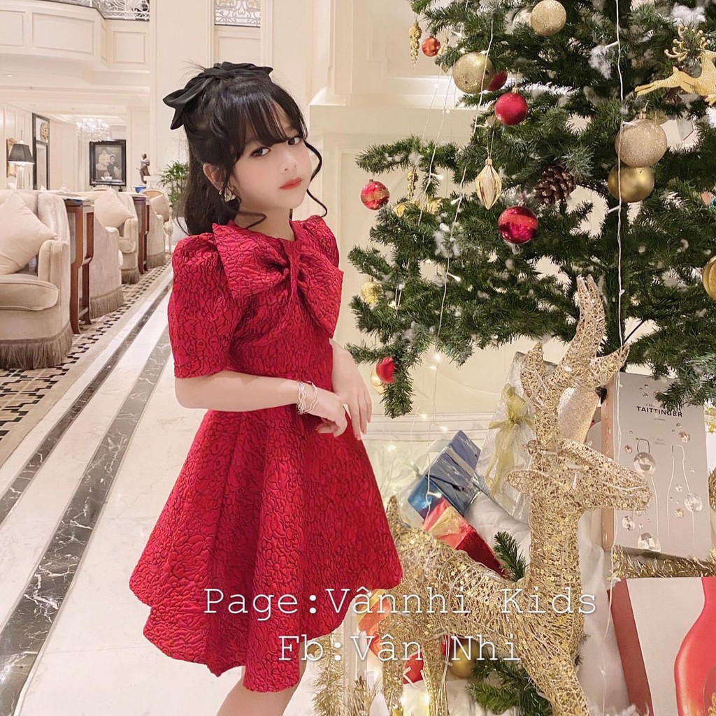 Váy gấm nơ to cho bé gái