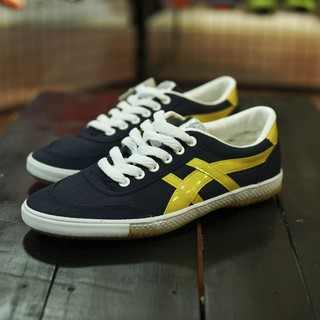 Giầy bóng đá Warrior - Xanh đen/vàng