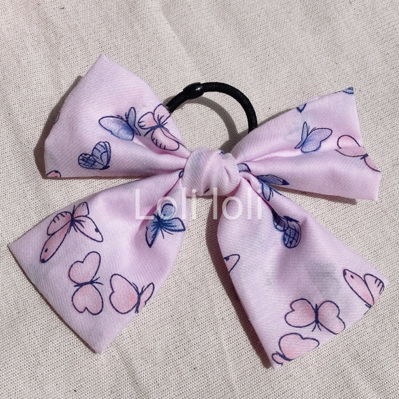 Cột  tóc nơ bướm xinh xắn hot trend dành cho nàng thêm xinh