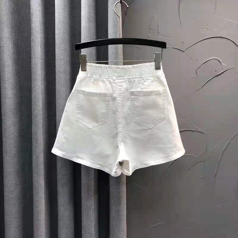 Quần short denim trắng chữ A lưng thun thể thao nóng bỏng Châu Âu