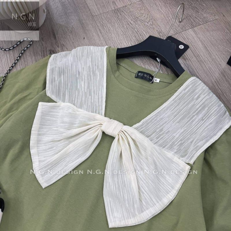 Váy suông xanh nơ ngực