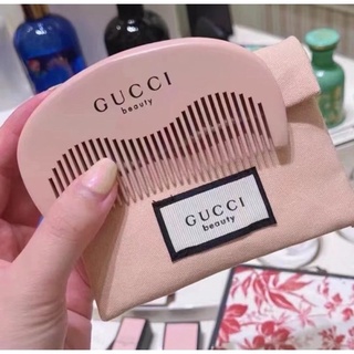 Lược bỏ túi gucci